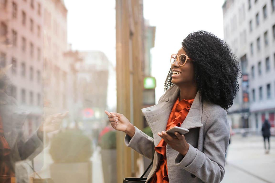 woman laughing on street