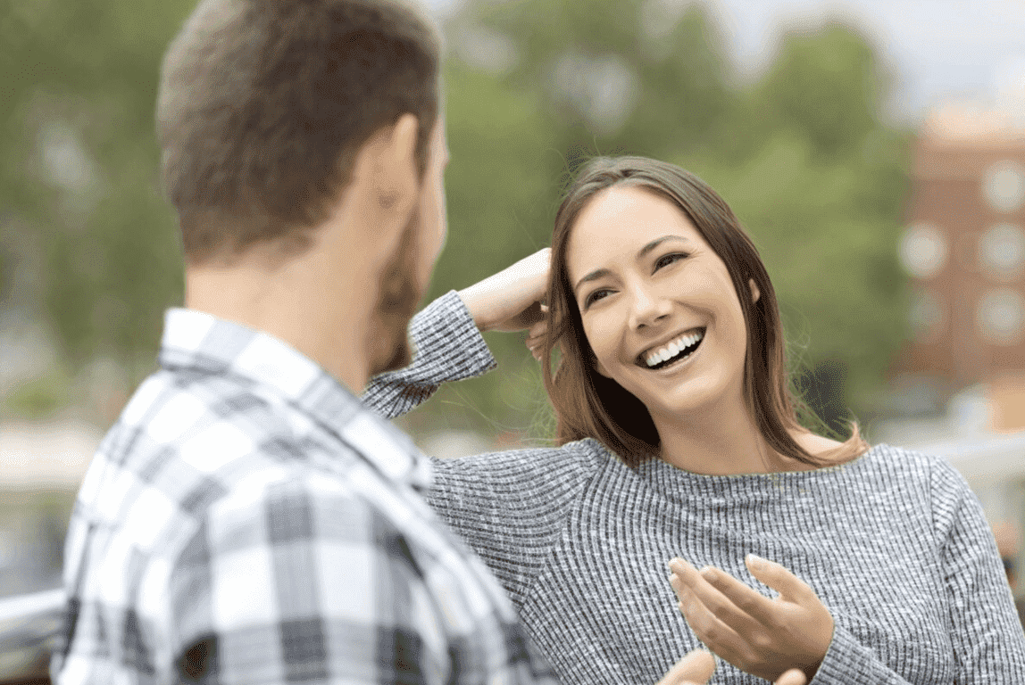 Couple flirting and laughing on their date